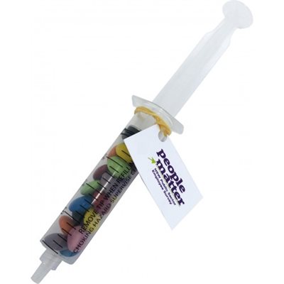 Syringe Filled With Chocolate Beans